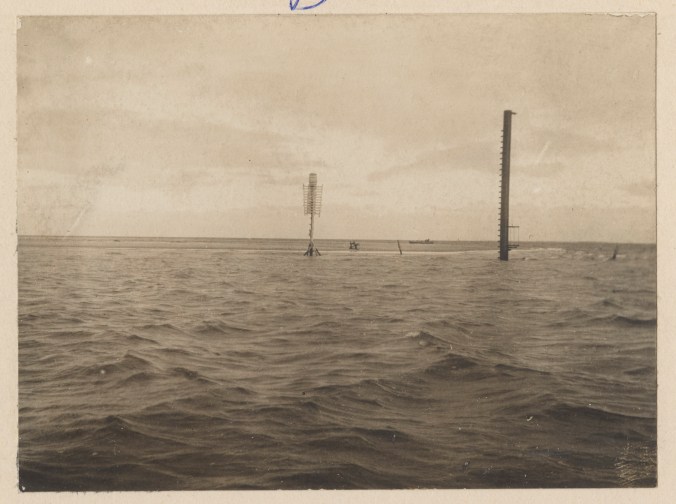 In June 1900, crews from the USLS's predecessor agency, the U.S. Lighthouse Board (USLB), erected this lens lantern at Wreck Point to help guide vessels seeking a lee inside Cape Lookout. Erected at the barb at the point of Cape Lookout Bight, the light was a welcome sight for many a mariner caught offshore in heavy weather. The Wreck Point Light gives some sense of the diversity of navigational aides built and maintained by the USLB and the USLS. According to <a href="https://uslhs.org/sites/default/files/attached-files/US%20Lighthouse%20Service%201915.pdf"><em>The United States Lighthouse Survey </em></a>for the year 1915, the USLS had 14,554 navigational aides in commission in U.S. waters as of that year. They included lighthouses, so-called "minor lights" (not tended by resident keepers), light vessels, gas buoys, float lights, and a wide variety of unlighted aids such as bell and whistle buoys, fog signals, and day beacons. Source: Records of the U.S. Coast Guard (RG 26), National Archives- College Park (#45694925)