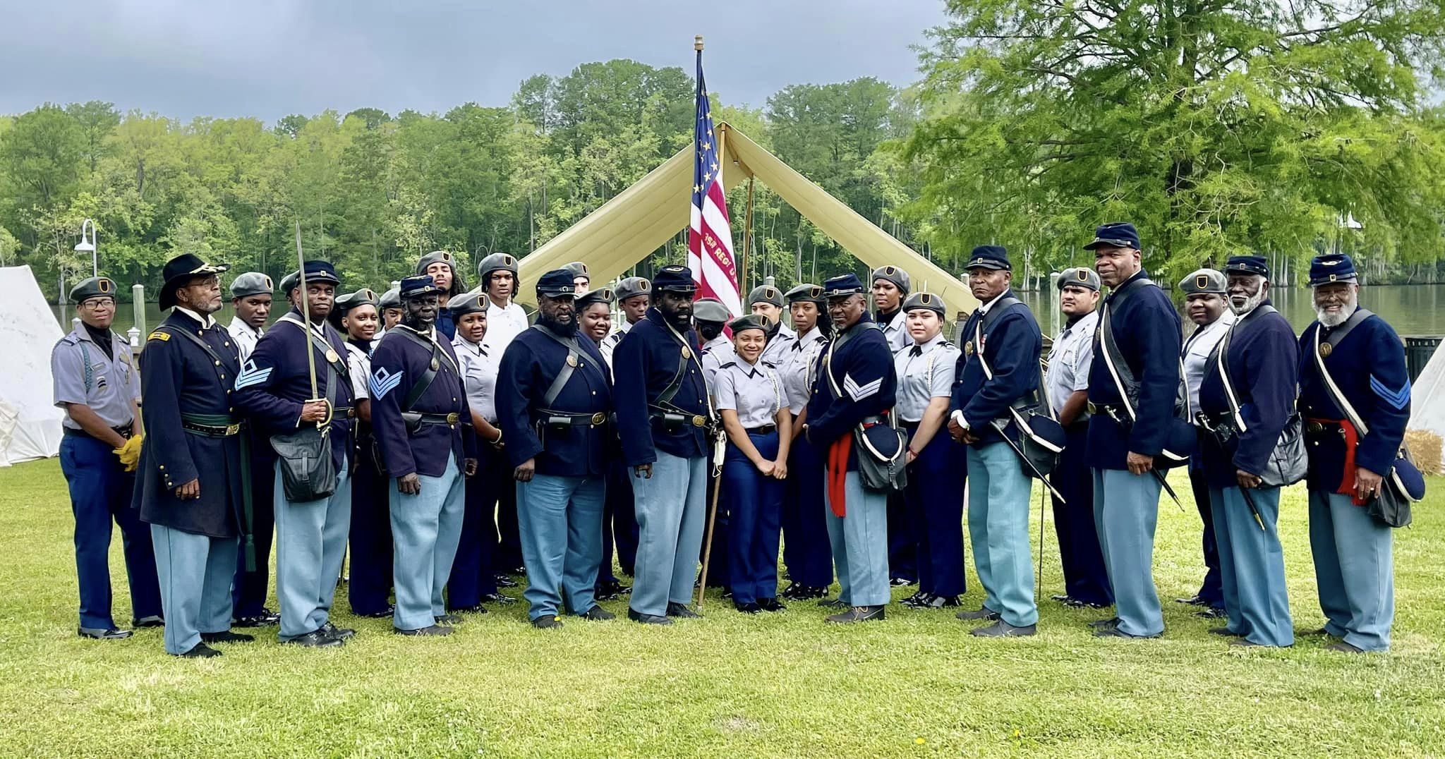 Local Junior ROTC cadets posed next to the Roanoke River with members of the 35th U.S. Reenacts Colored Troops from New Bern, N.C., and from the 2nd Regiment, U.S. Colored Light Artillery, Battery B from Wilmington.