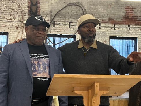 Local poet Mr. Ronald Brooks (right) also shared two very powerful poems with the audience. In this photo, he is standing with James Williams-- we could all tell that they had been friends since elementary school. Photo by David Cecelski