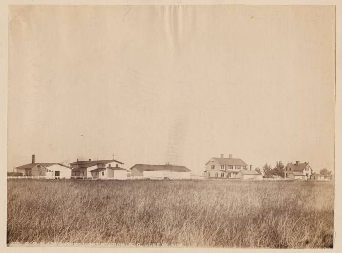 This is a view of Long Point Light Station, June 1893. Located on a marshy island on Currituck Sound, just north of Waterlily, the complex included a gas works for manufacturing the compressed gas used in light buoys (more on it in a bit), a 2-story barracks for two assistant keepers and their families, and a principal keeper's cottage (on far right). According to a splendid article by Meghan Agresto ("A Brief History of Currituck Beach Light Station's Smaller Keeper's Dwelling"), the Long Point Light Station was founded in 1879 and the principal keeper at the time of this photograph was a USLS veteran named William Shinault. In her article, Ms. Agresto notes that the gas works shut down in 1914 and a few years later, in 1920, the Principal Keeper's cottage was floated across Currituck Sound to the Currituck Beach Light Station, where she is the resident site manager today. Photo source: Records of the U.S. Coast Guard (RG 26), National Archives-College Park (#45694157)