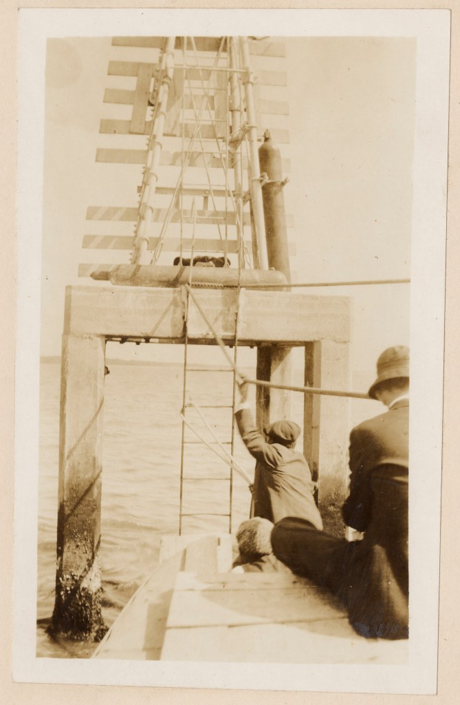 Keeper Berry and the crew of the Palmetto maintained a long series of range lights that marked the ship channel on the Lower Cape Fear. This photo, also dated May 1917, shows them coming up on the light for Snow Marsh Channel and Reeves Point Channel on a section of the river between the village of Southport and that west of what is now the <a href="https://historicsites.nc.gov/all-sites/fort-fisher">Ft. Fisher Historic Site</a>. Source: Records of the U.S. Coast Guard (RG 26), National Archives- College Park (#45697830)