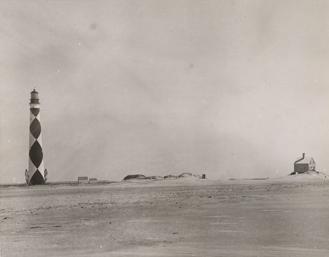 Cape Lookout Light Station, 1889. I don't know if I've seen a photograph that better captures the austere beauty of the Cape in that day and time. The building on the far right is the original Keeper's Quarters, built in 1812 and apparently abandoned by this point in time. On both sides of the lighthouse's base, we can just glimpse the two chimneys of the second Keeper's Quarters, built in 1873. The two small buildings to the left of the lighthouse are an oil house and perhaps a coal shed or other storage building. Source: Records of the U.S. Coast Guard (RG 26), National Archives- College Park
