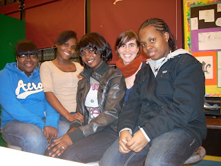 During the 2009-10 school year, students from Paul Robeson High School in Brooklyn interviewed 43 longtime residents of Crown Heights, including Evangeline Porter-- they were the driving force behind the <a href="https://oralhistory.brooklynhistory.org/collections/voices-of-crown-heights-oral-histories/">Crown Heights Oral History Project</a>. In this photo, we can see project coordinator Alexa Kelley (4th from left) and the project's interviewing team:  (left to right) Treverlyn Dehaarte, Monica Parfait, Floyya Richardson, and Quanaisha Phillips. Not pictured is Annie Montilus, also from Paul Robeson High School. Photo courtesy, Crown Heights Oral History Project