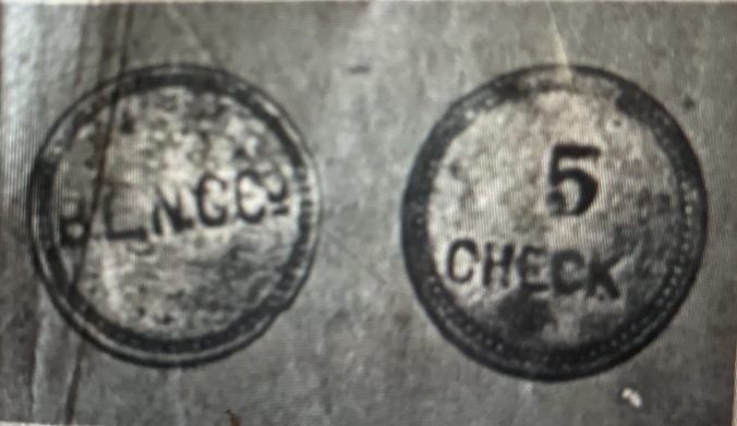 Tokens paid to oyster and clam shuckers at the Beaufort Little Neck Clam Co.'s cannery in Swansboro, N.C., ca. 1907-08. The tokens were from Tucker Littleton's personal collection. Photo from The Tideland News (Swansboro), 8 Oct. 1980. 