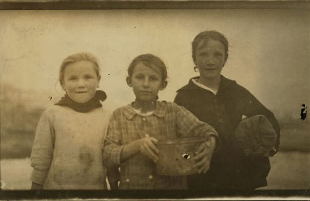 Oyster shuckers (left to right) Rosie Zinsoska, Lena Krueger, and Annie Kadeska, Pass Christian, Mississippi, Feb. 1916. Photo by Lewis Hine. Source: National Child Labor Committee Collection, Library of Congress, Prints and Photographs Division