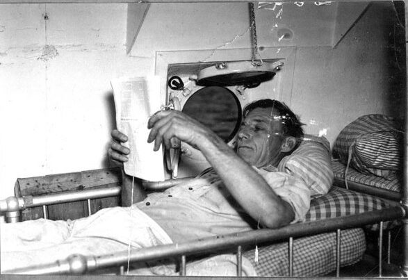 A crewman reading in his bunk on the Diamond Shoals Lightship, 1939. Photo courtesy, State Archives of North Carolina