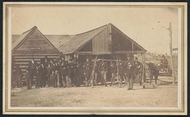 Union soldiers and civilians at the Provost Guard Headquarters at Newport Barracks, 10 miles NW of Morehead City, N.C., ca. 1862-65. Courtesy, Library of Congress