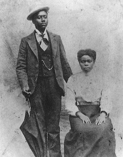 According to North Carolina Historic Sites' stellar #TrueInclusion web site, August Ann "Gustanna" Collins was one of the survivors of the Collins family's plantation at Lake Phelps. Born there circa 1846, she gained her freedom with the fall of the Confederacy in 1865. She and her husband James Cabarrus (seen with her here) eventually settled in Creswell, a small town a few miles from Lake Phelps. Photo courtesy, North Carolina State Historic Sites