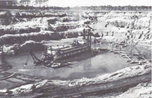 A dredge at Texas Gulf's phosphate mining operation, Aurora, N.C. 1963. The international mining congloomerate Texas Gulf Sulfur began digging for phosphate there in the mid-1960s. Photo courtesy, Aurora Fossil Museum