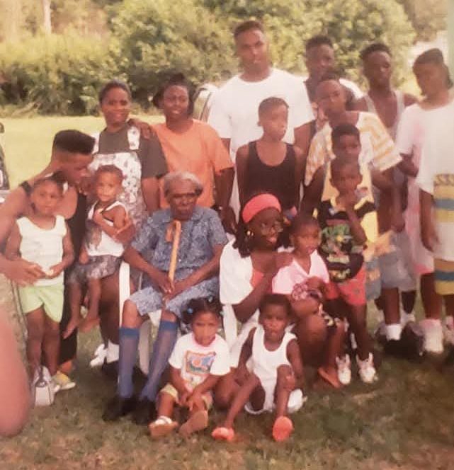 Latonya Jones' great-great-grandmother Emma Hickman Roberson with some of the younger members of her family at a family gathering some years ago. Photo courtesy, Latonya Jones
