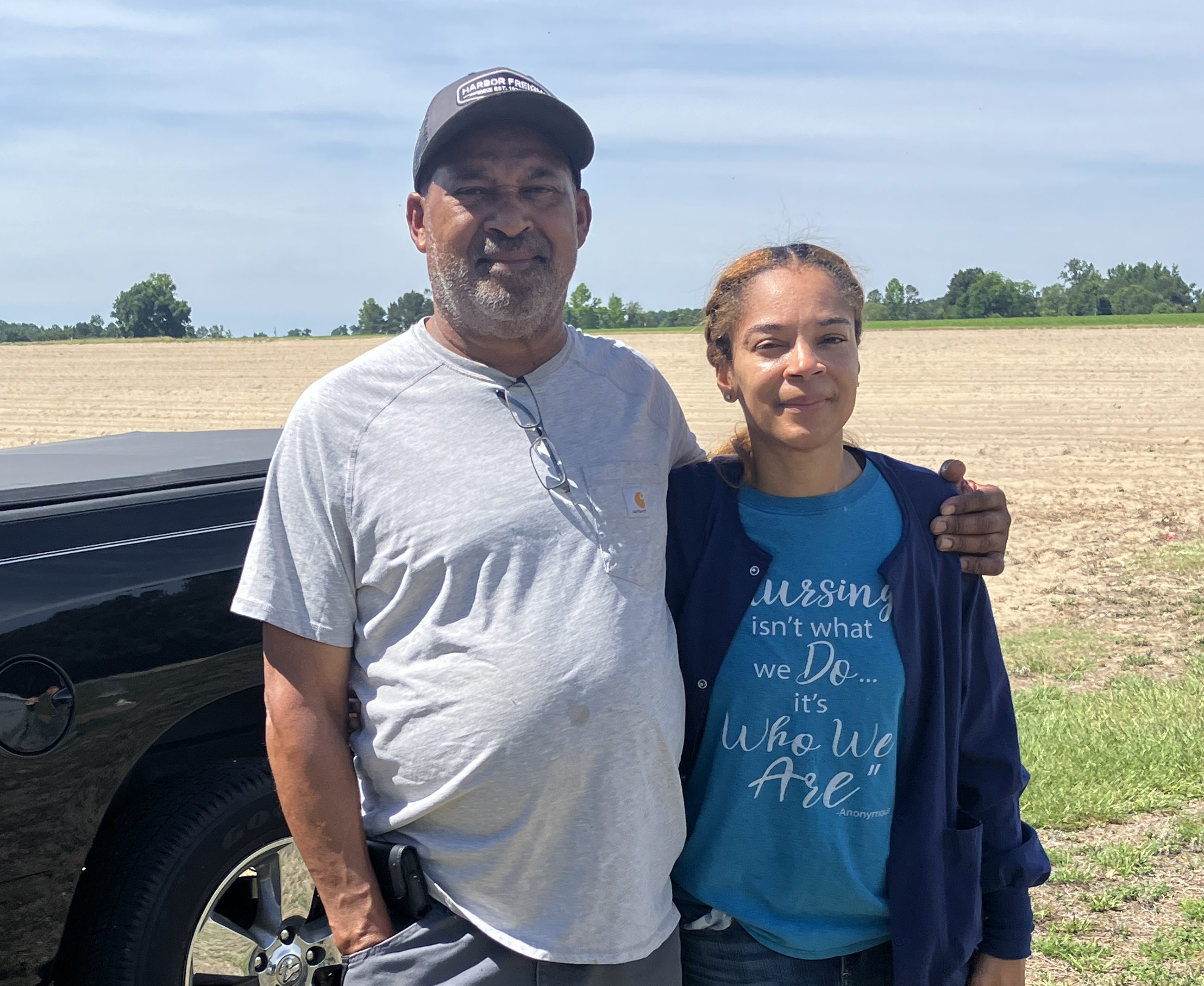 David Brown and his daughter Ignacia Joyner at the site of a community cemetery in Browntown, a rural community south of Snow Hill, N.C. Photo by David Cecelski