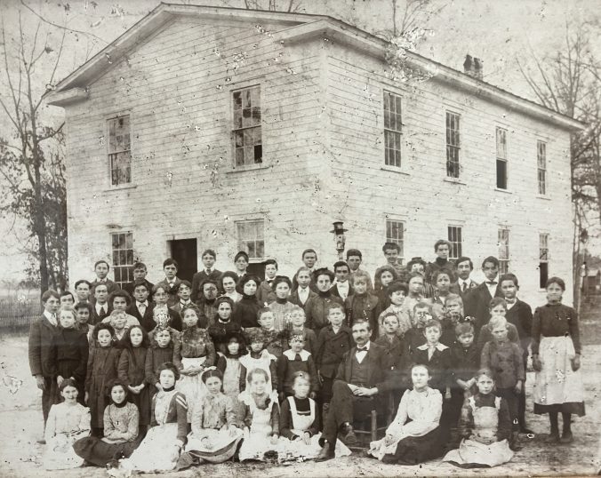 Students and teachers at the community school in Institute, N.C., ca. 1910. The building was originally part of the Lenoir Collegiate Institute. 